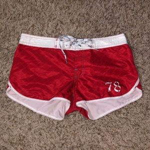 Red and white swim shorts